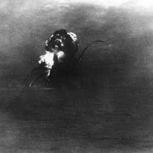 USS Princeton (CVL 23) blows up after being torpedoed by USS Reno