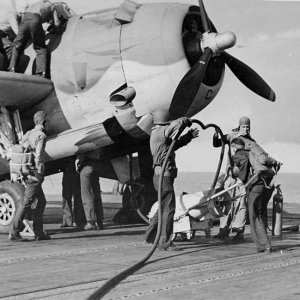 refuel a TBF 1 of VT 4 on the flight deck of the USS Ranger during Operation Torch November 8 19