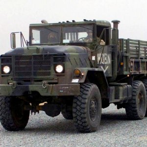 US Marine Corps 030224 M XT622 034 USMC M923 (6X6) 5 ton cargo truck heads a convoy departing Ca