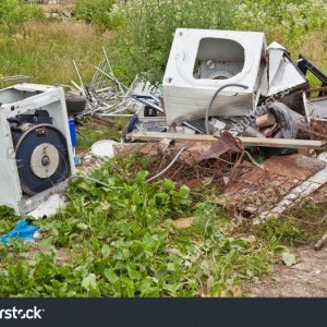 stock photo junk yard with garbage scattered in the field 80947621