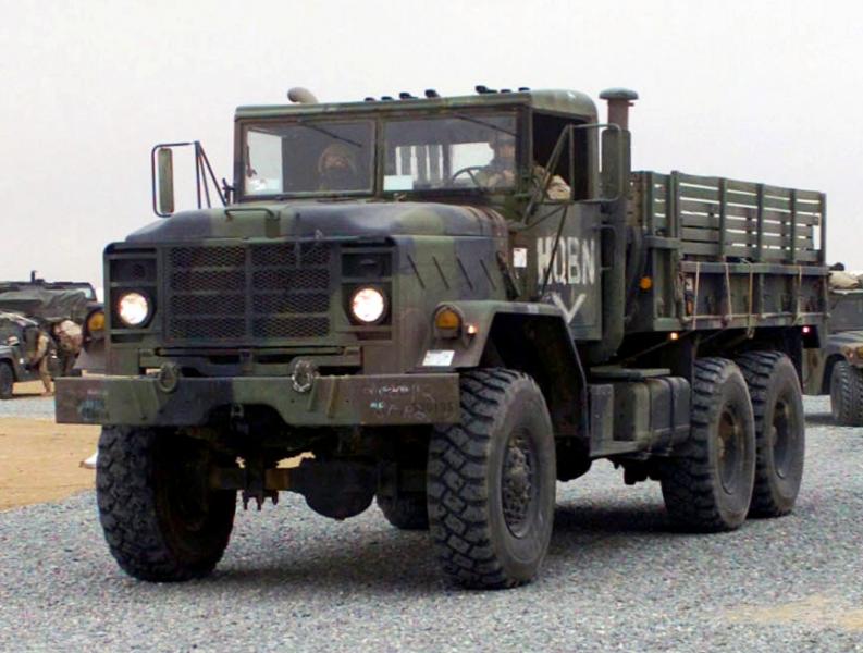 US Marine Corps 030224 M XT622 034 USMC M923 (6X6) 5 ton cargo truck heads a convoy departing Ca