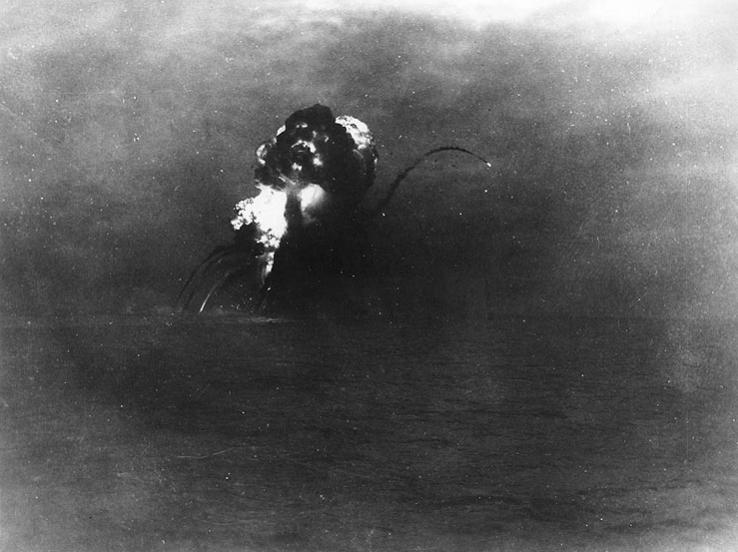 USS Princeton (CVL 23) blows up after being torpedoed by USS Reno